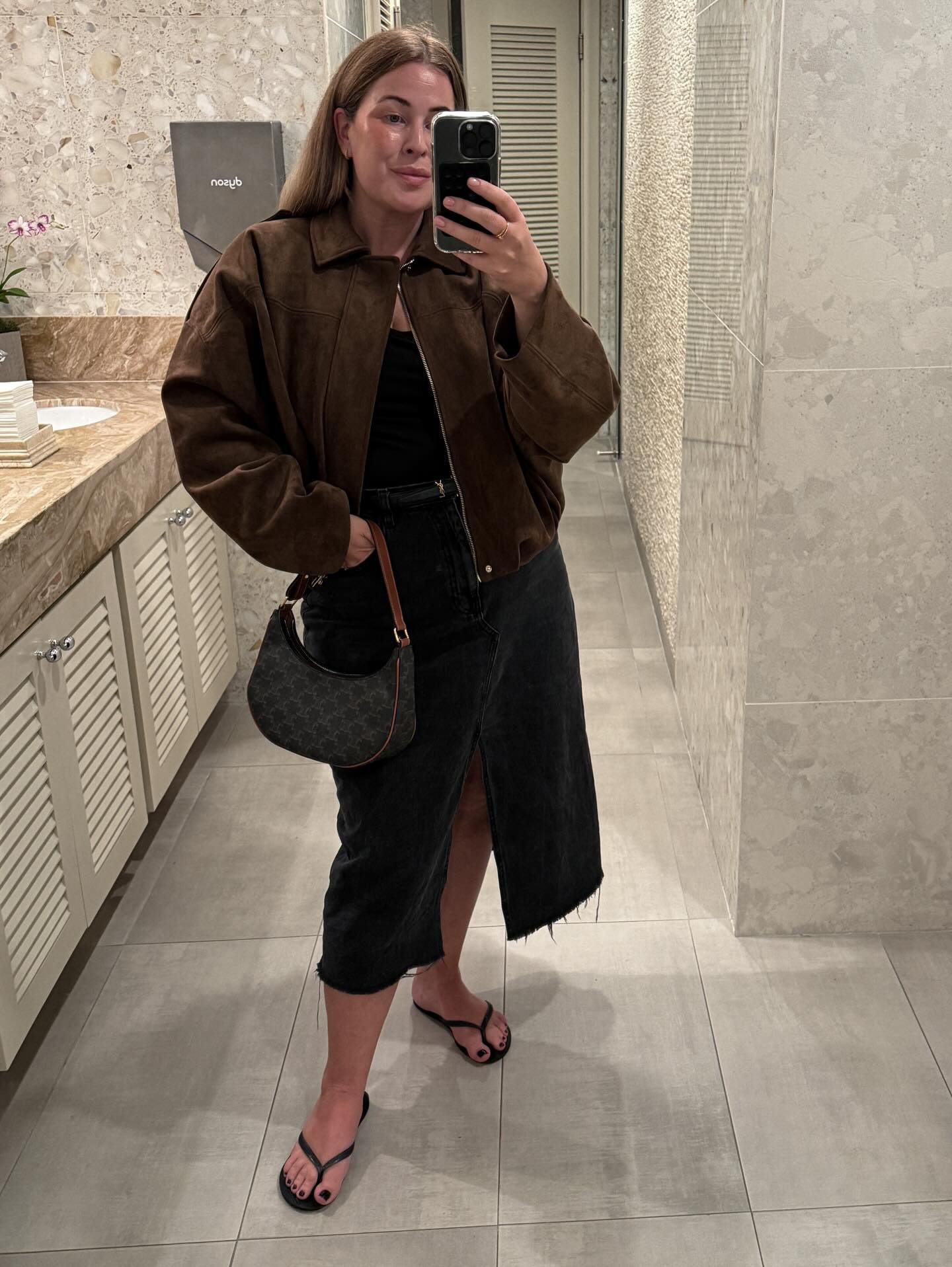 A Brown Jacket with a Dark Denim Skirt for Polished Everyday Ease